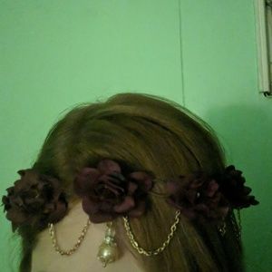 A dark purple floral headband
